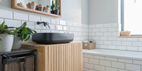 Black,Bathroom,Sink,On,Wooden,Cabinet,And,Mirror.,Industrial,Interior